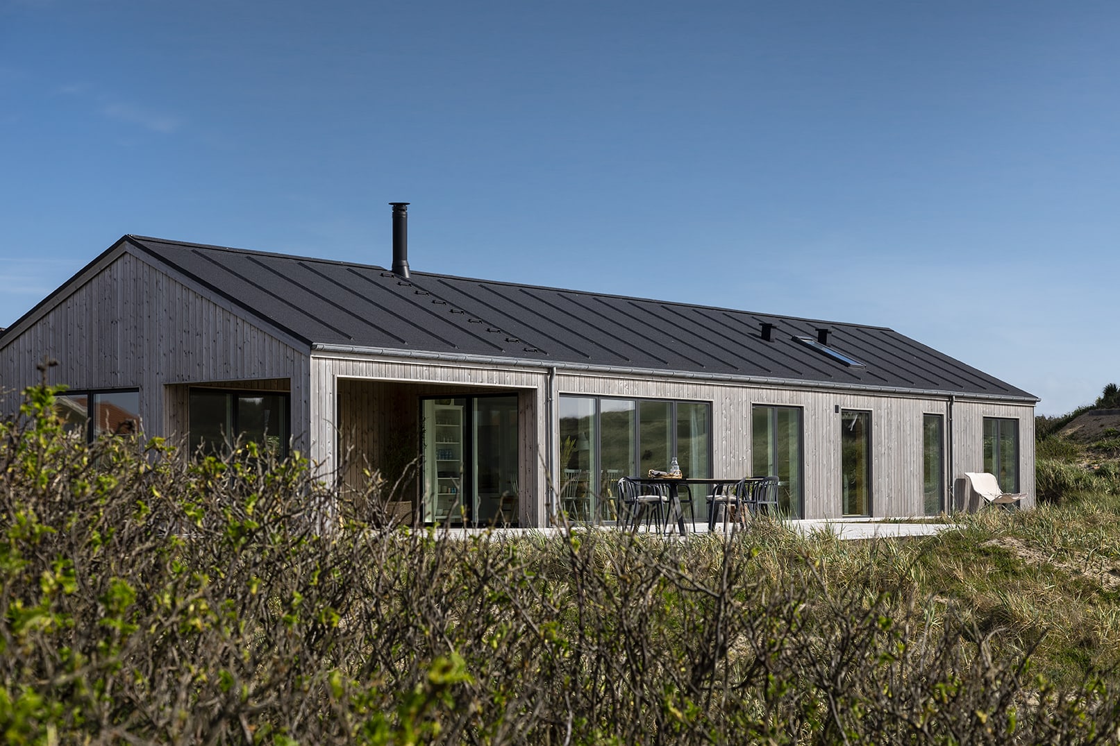 Skanlux sommerhus bygget med Superwood brædder